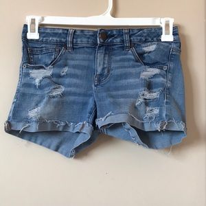 Low rise distressed jean shorts